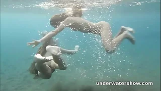 Julia and Masha are swimming nude in all directions the great deal